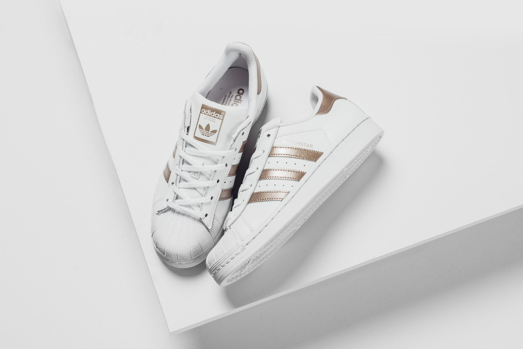 Adidas Originals Women's Superstar In White/Bronze Feature Adidas Originals Women's Superstar In White/Bronze Feature