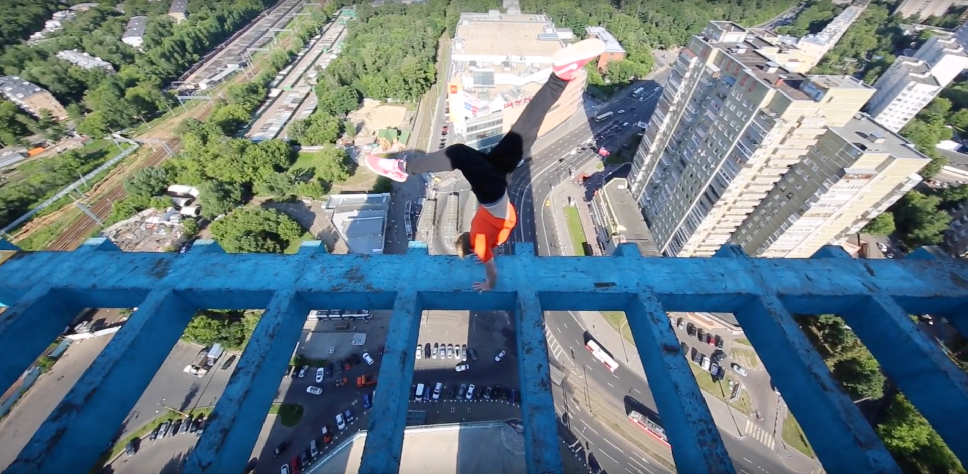 Russian Climber Performs Death-Defying Rooftop Stunts – Feature