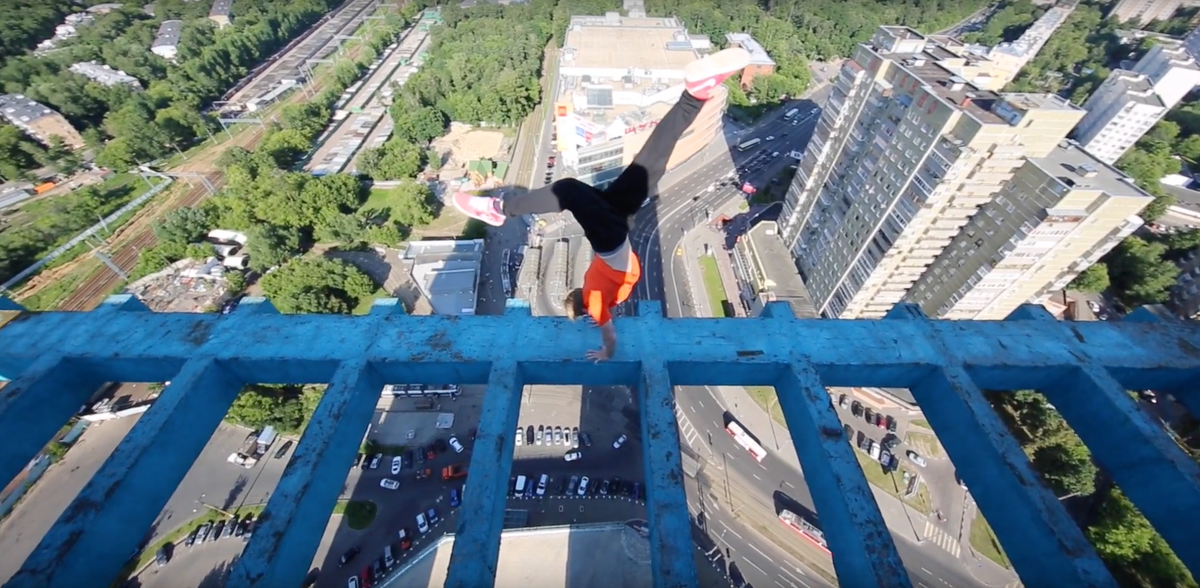 Russian Climber Performs Death-Defying Rooftop Stunts