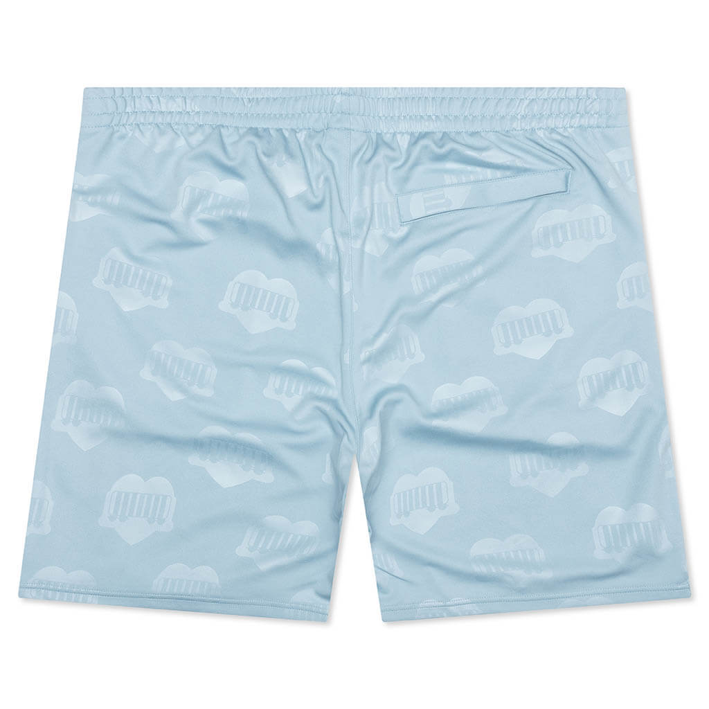 水色のCarhartt製サッカーシャツとショーツのセット 水色のCarhartt製サッカーシャツとショーツのセット 水色のCarhartt製