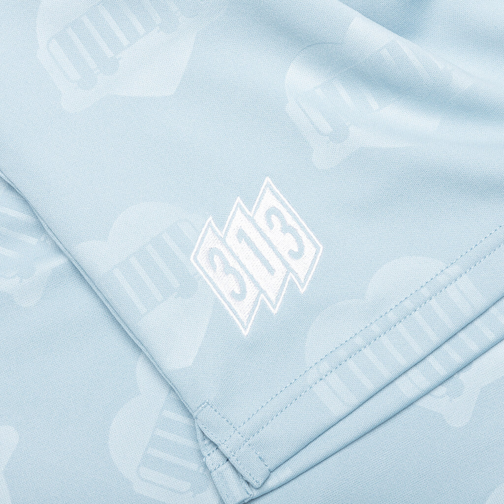 水色のCarhartt製サッカーシャツとショーツのセット 水色のCarhartt製サッカーシャツとショーツのセット 水色のCarhartt製