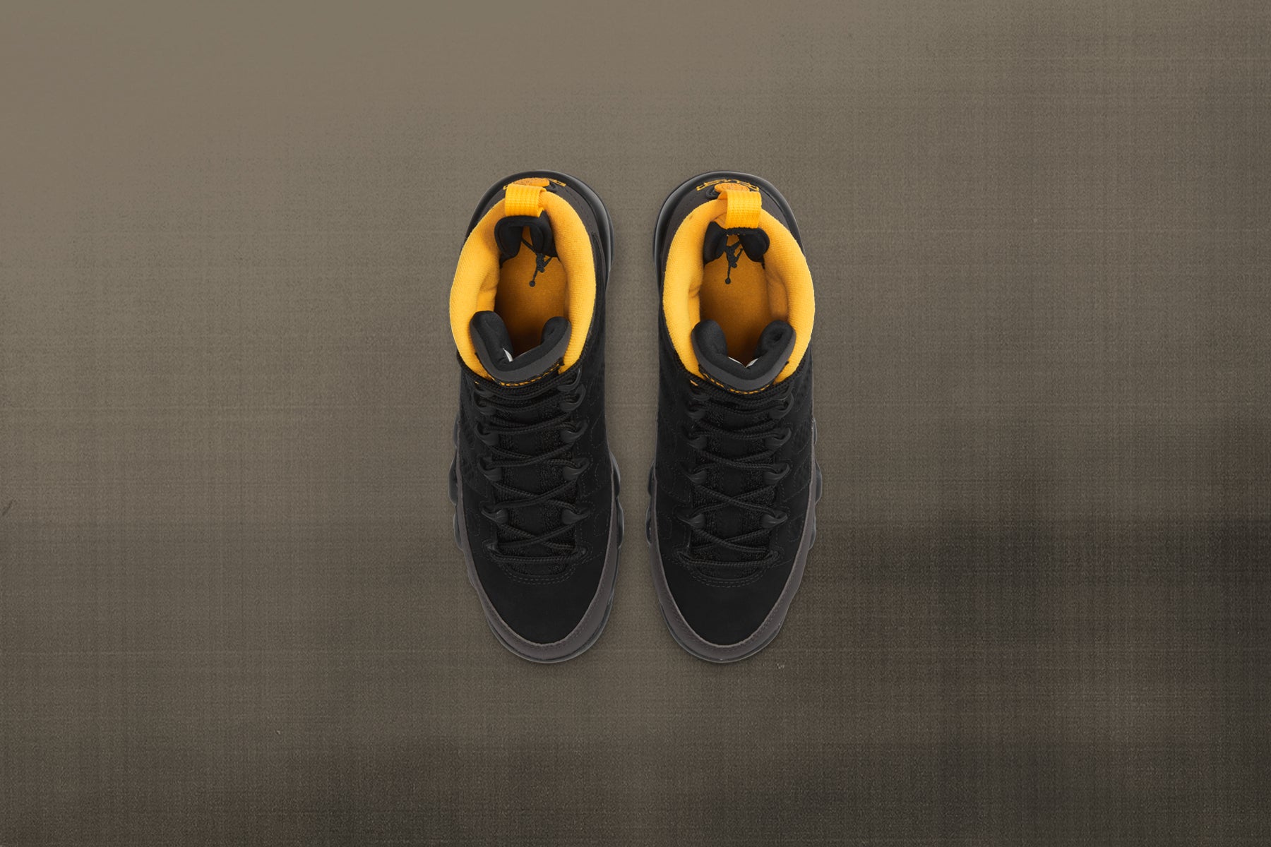 jordan 9 dark charcoal university gold on feet