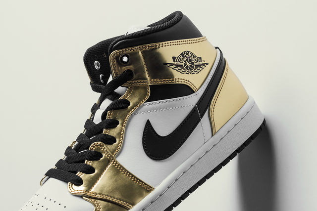 aj1 mid black gold
