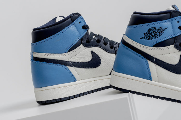 sail obsidian university blue jordan 1