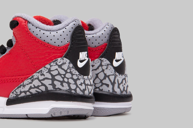 grey and red jordan 3