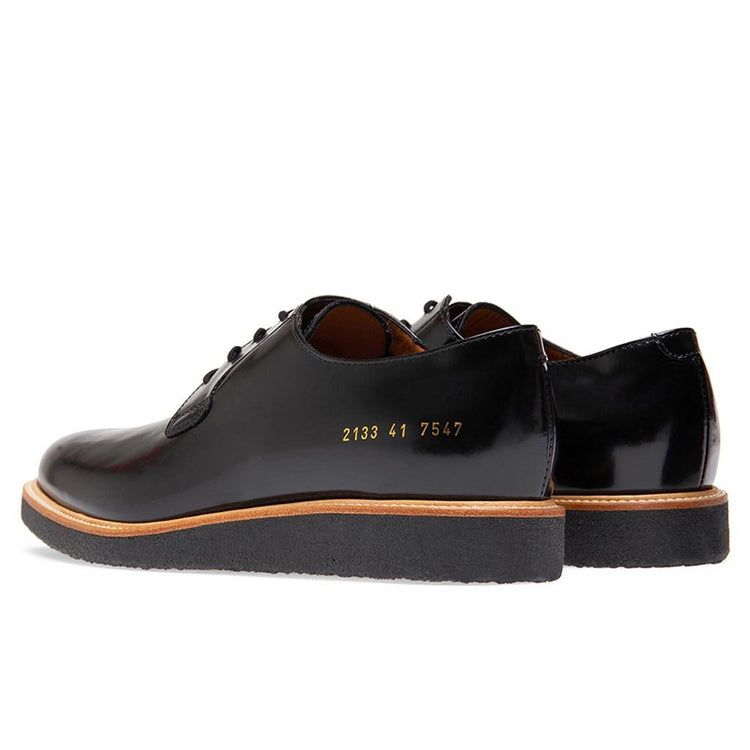 Common Projects Derby Shine Black Common Projects Derby Shine in Black & Black | FWRD main image 2