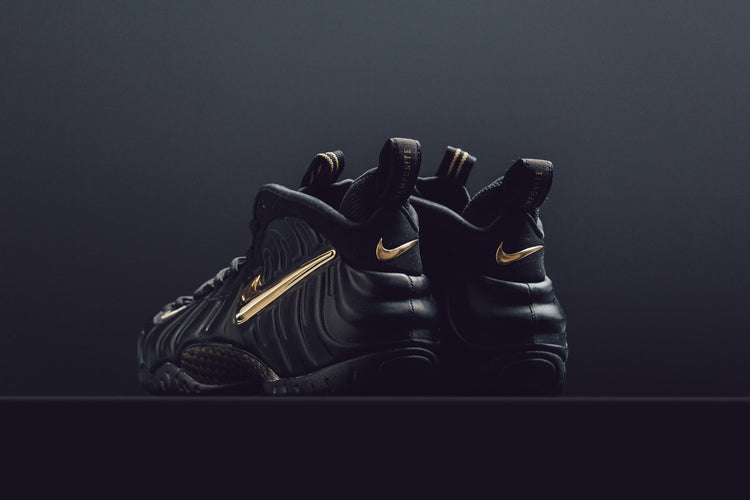 foamposite pro black metallic gold